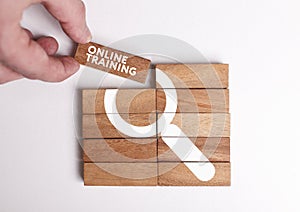 Business, Technology, Internet and network concept. Young businessman shows the word: Online training