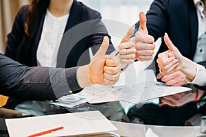 Business thumb up success achievement company