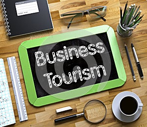 Business Tourism on Small Chalkboard. 3d Render