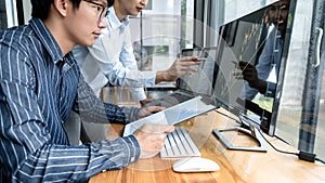 Business trader team checking stock market online analyzing graph data on laptop screen to brainstorming about trading online