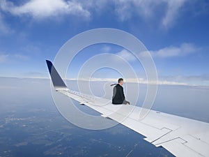 Business Travel Concept, Businessman Flying on Jet