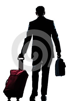 Business traveler man walking rear view