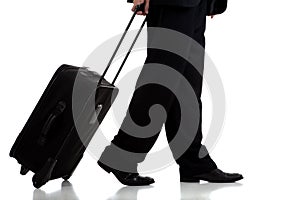 Business traveler or pilot with suitcase