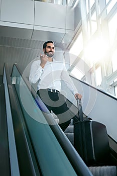 Business Trip. Business Man Traveling In Airport