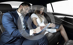 Business trip- Talking on mobile to work of car