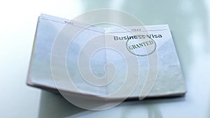 Business visa granted, seal stamped in passport, customs office, travelling