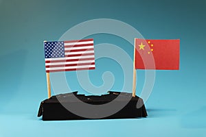 Business war between USA and China. West between East. Communism between capitalism.