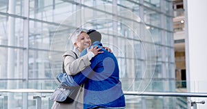 Business, welcome and a man hugging a woman in the office, greeting a colleague with a friendly smile. Collaboration