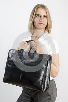 Business woman with aback bag in her hands. photo