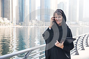 Business woman in an abaya.