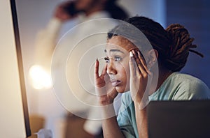 Business woman, anxiety and stress at computer in office at night working late on deadline. Tired African entrepreneur