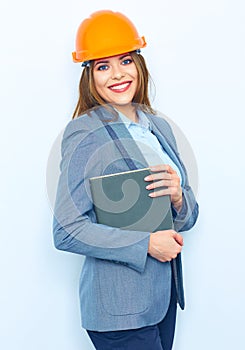 Business woman architect holding book