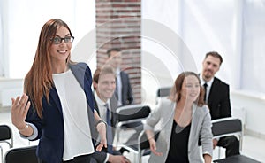 Business woman while asking questions during seminar