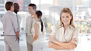 Business woman with associates smiling