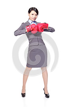 Business woman boxing