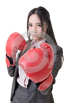 Business woman with boxing gloves