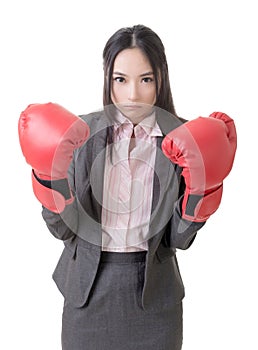 Business woman with boxing gloves