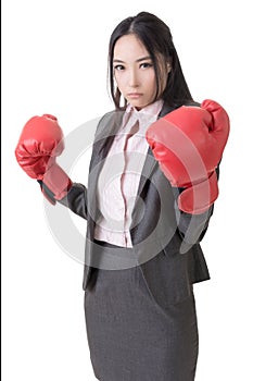 Business woman with boxing gloves