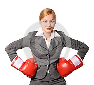 Business woman with boxing gloves isolated