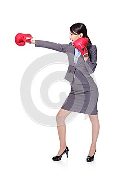 Business woman boxing and hitting