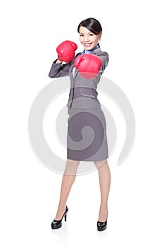 Business woman boxing, punching