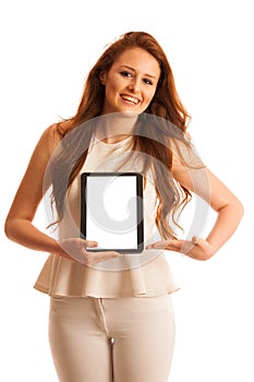 Business woman brousing the web on a tablet isolated over white