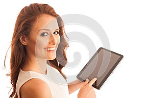 Business woman brousing the web on a tablet isolated over white