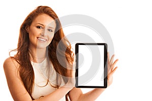 Business woman brousing the web on a tablet isolated over white