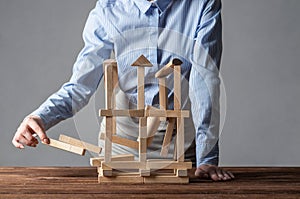 Business woman building construction on table