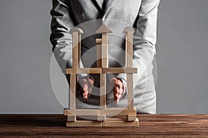 Business woman building construction on table