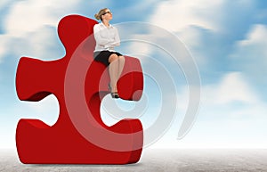 Business woman building a red puzzle on a sky background.