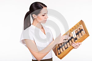 Business woman calculating finance with abacus
