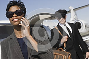 Business Woman On A Call At Airfield photo