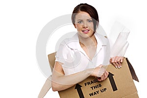 Business woman in a cardboard box