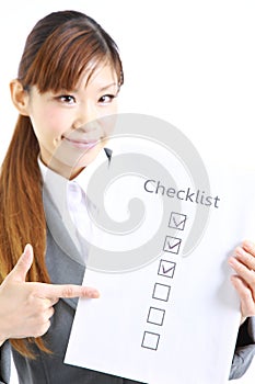 Business woman with checklist