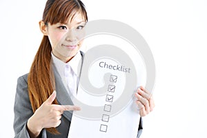 Business woman with checklist