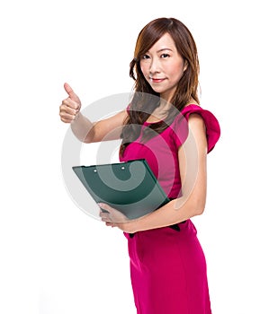 Business woman with clipboard and thumb up