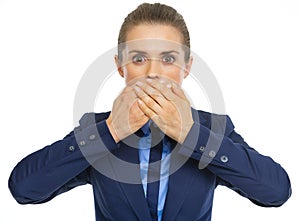 Business woman closing mouth