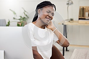 Business woman, computer and frustrated hand on neck for tension, stress and angry working on project. Black person, pc