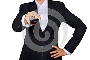 Business woman is control with remote