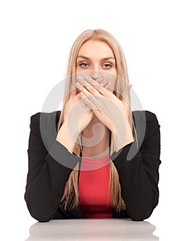 Business woman covering her mouth