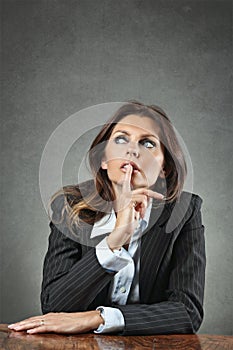 Business woman deeply thinking