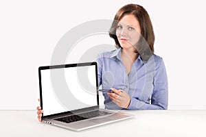 Business woman is demonstrating something on the laptop screen photo