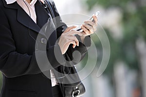 Business Woman Dialing On Cell Phone