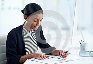 Business, woman and documents with pen in office for article idea, strategy and brainstorming. Journalist, writer and