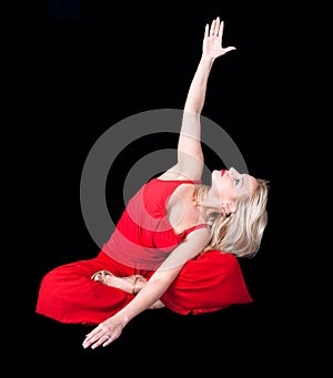 Business woman doing joga at lunch break