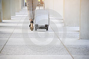 Business woman Dragging suitcase luggage bag