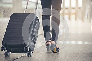 Business woman  Dragging suitcase luggage bag