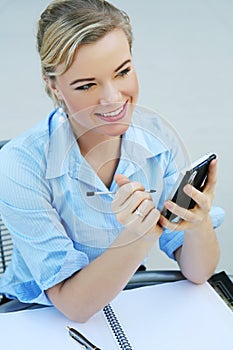 Business Woman with Electronic Device