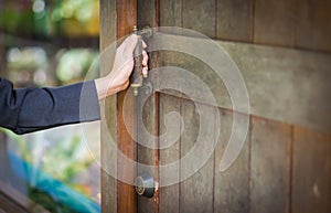 Business woman Entering an Office , Opening the vintage door